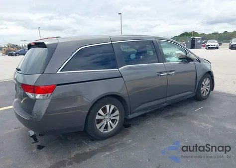 2014 Honda Odyssey Ex-L z USA, uszkodzony, nr VIN 5FNRL5H65EB003909